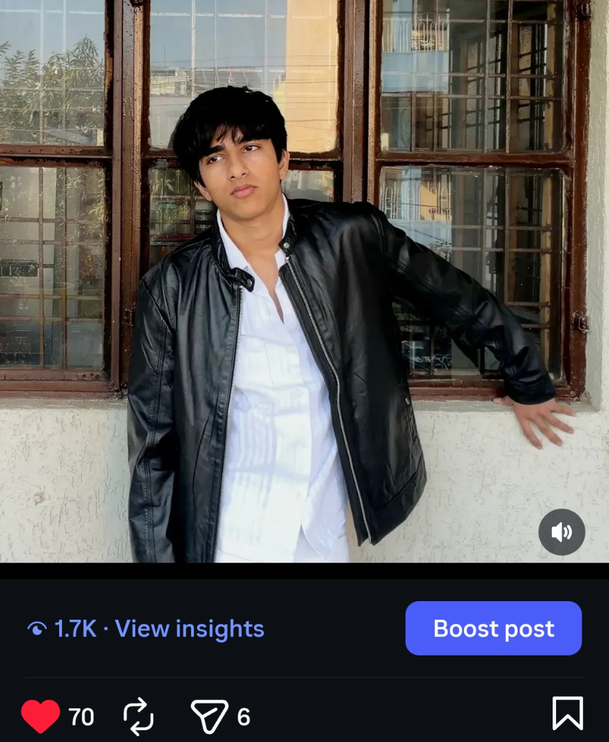 Manas Tagde — portrait, black leather, window light