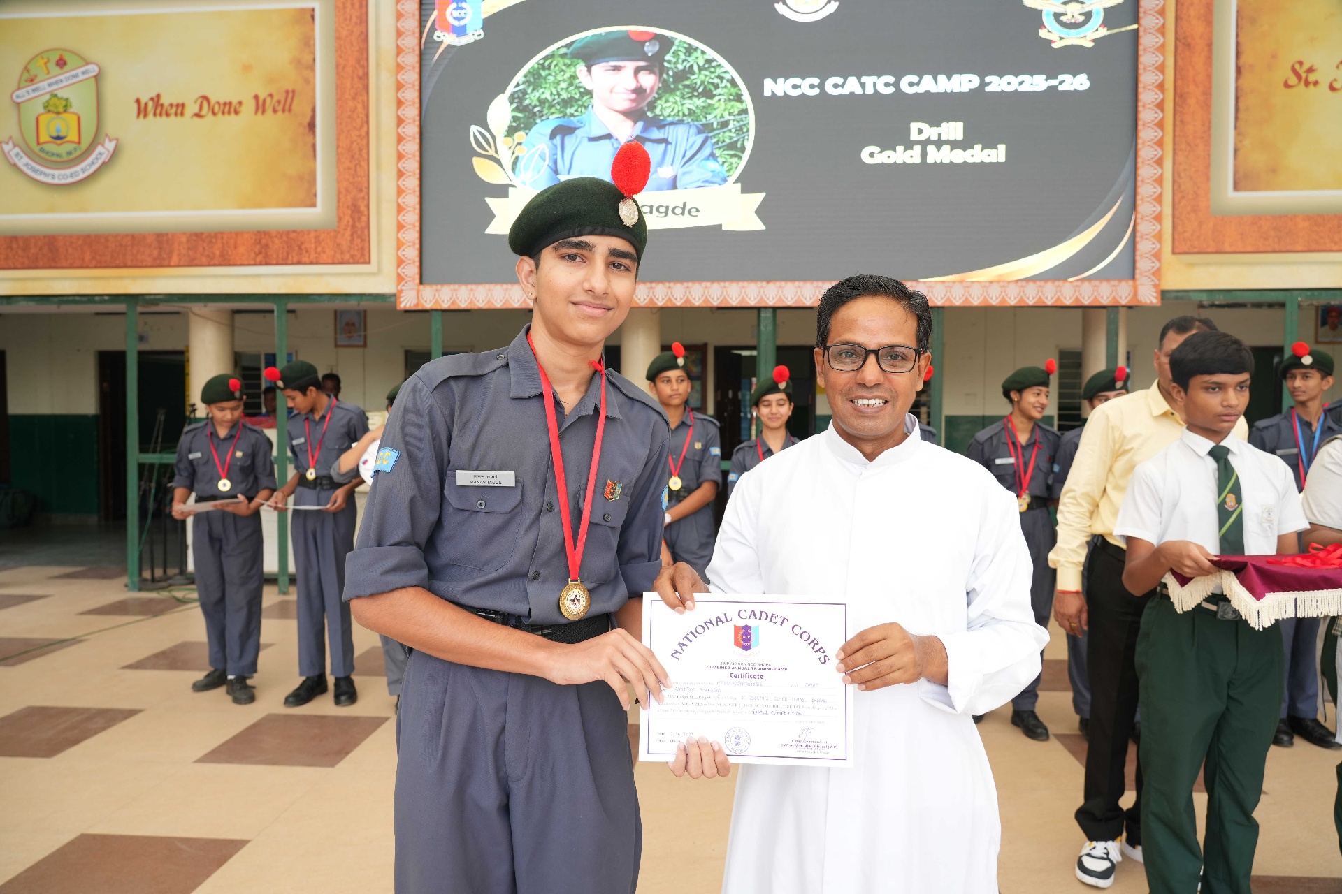 Manas Tagde receiving NCC CATC Camp 2025-26 Drill Gold Medal certificate
